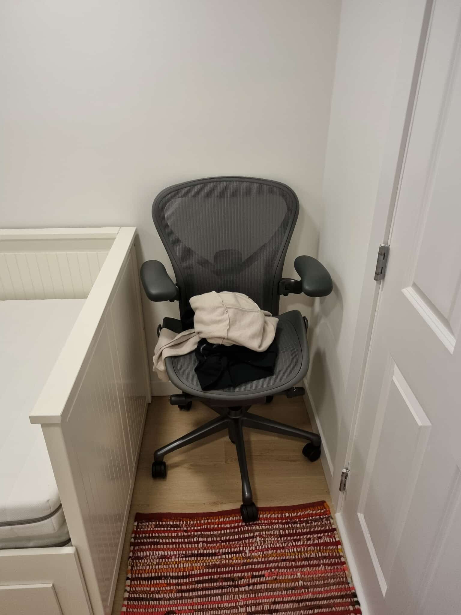 Office chair tucked in the corner